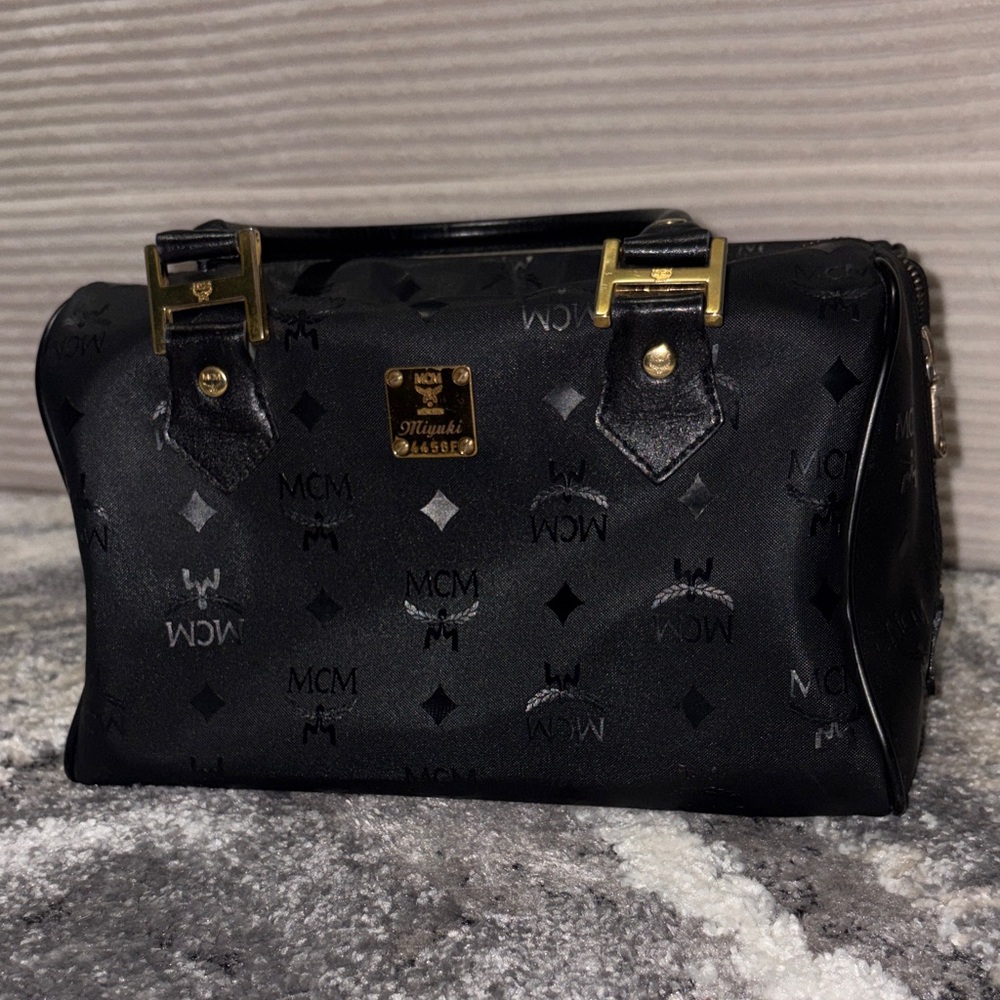 MCM Black Satchel with Gold Accents